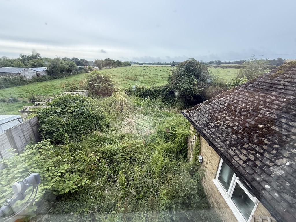 Lot: 132 - RURAL SEMI-DETACHED HOUSE IN NEED OF COMPLETE REFURBISHMENT - View to rear from Semi
